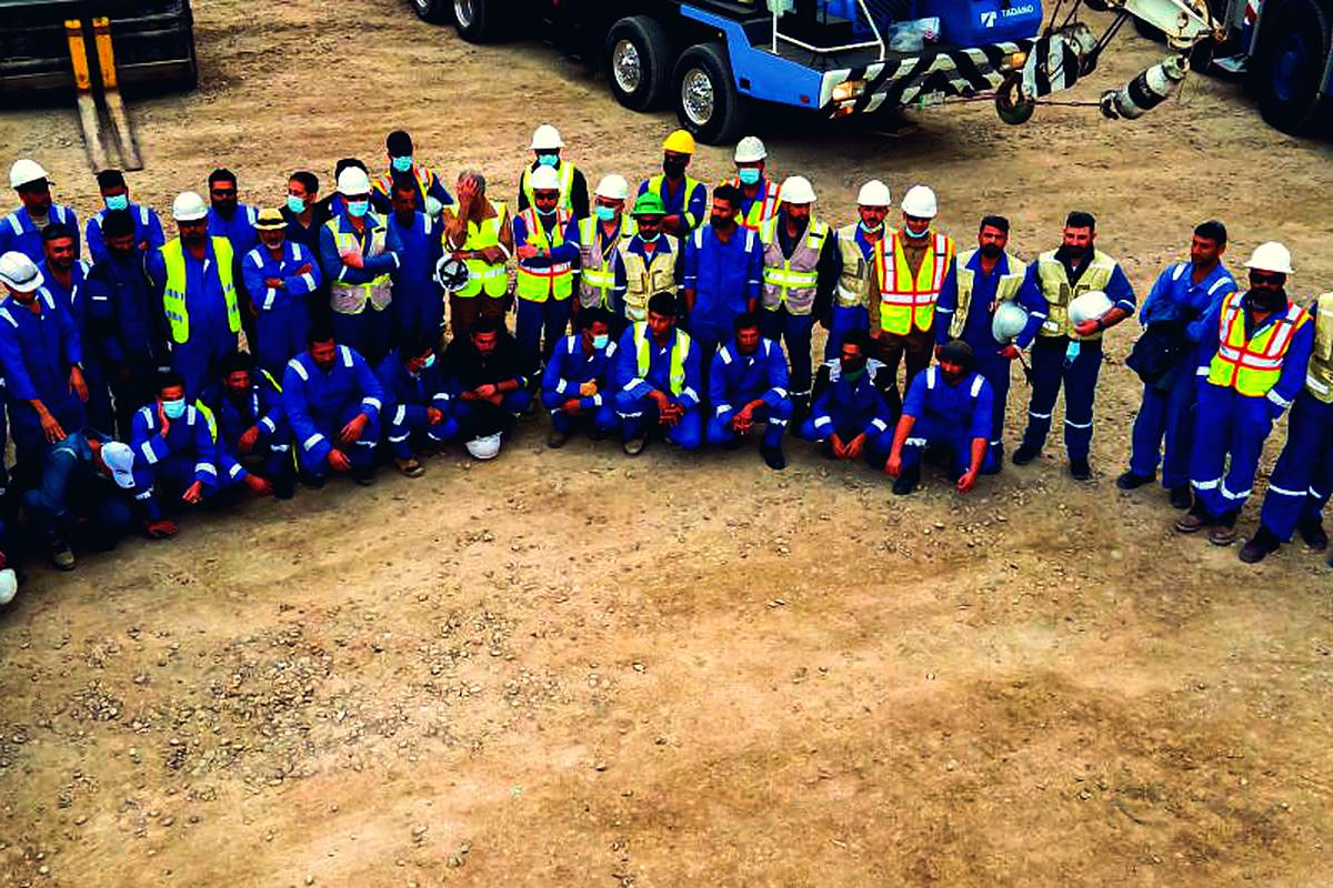 Al Yamama Engineering site crew in safety gear, Basra