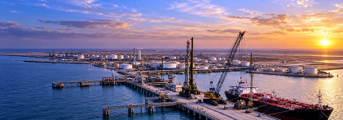Industrial port terminal at sunset
